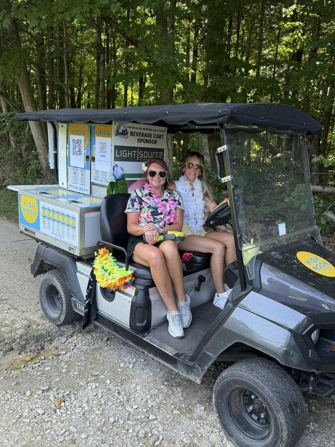 Image of Premium Beverage Cart Sponsor w/ golf & hole sponsorship
