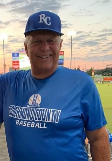Ron Graboski smiling in a baseball stadium