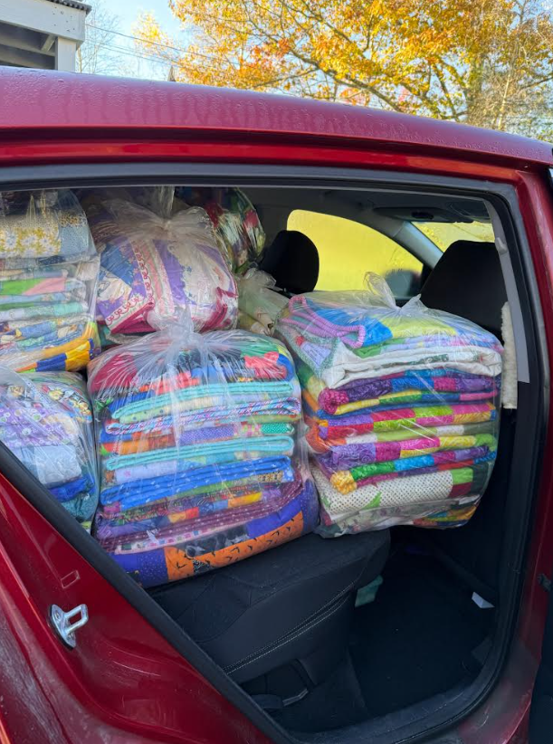 A trunk full of over 300 quilts, made by Ladies of the Lakes quilters, to donate to each child and their siblings while residing at David&rsquo;s House as the children receive life-saving medical procedures at Dartmouth Hitchcock Hospital.